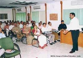 professor meeting School of Studies in Distance Education, Jiwaji University (SSDE, Gwalior) in Gwalior